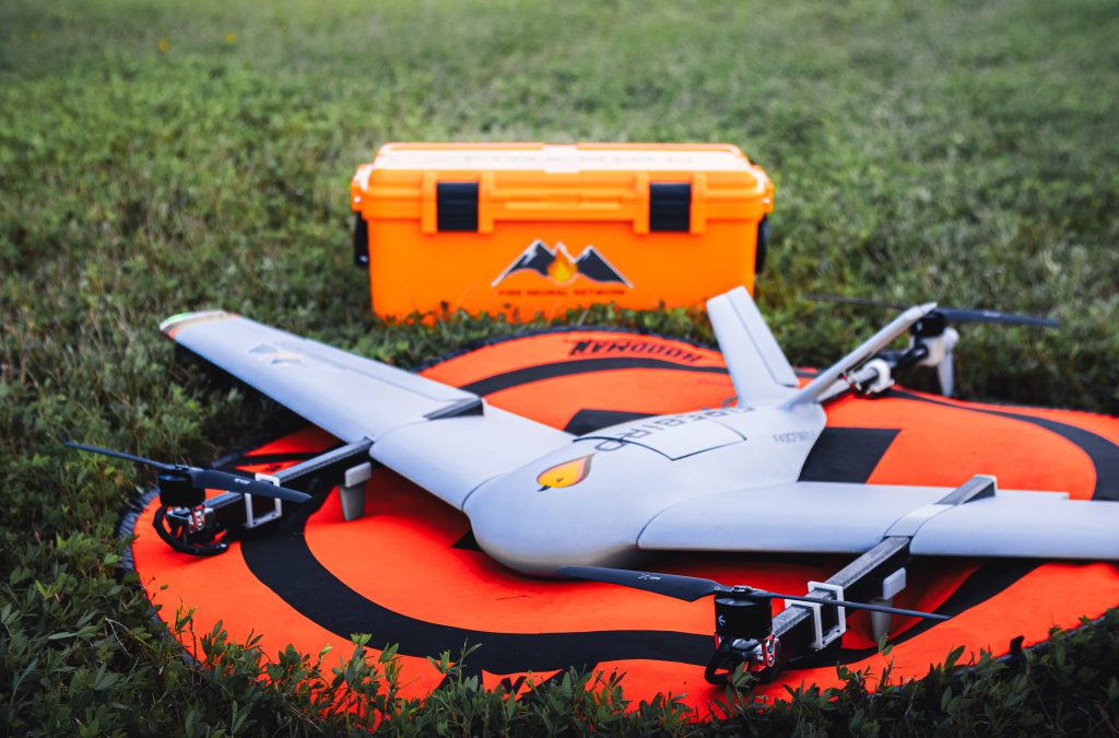 a fire-finding drone for Fire Neural Network sits on a launch pad, ready for take off