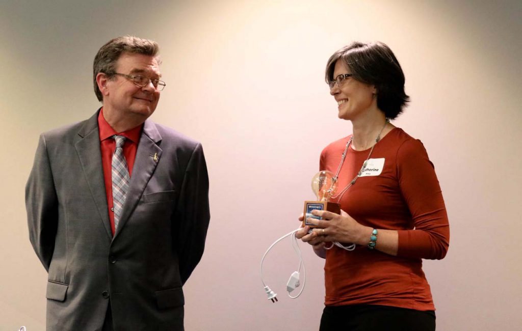 Dr. David Norton with "Invention of the Year" awardee Cate Price.