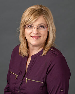 Headshot of Sally Helgeson