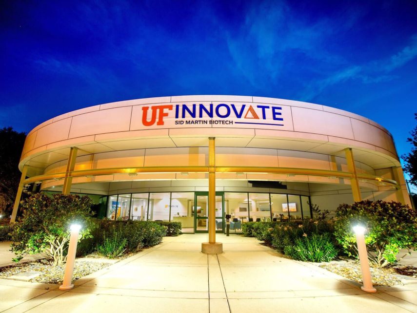 The facade of UF Innovate's Sid Martin Biotech at night.
