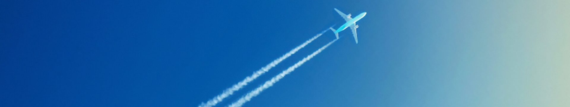 An aircraft flying into the sky