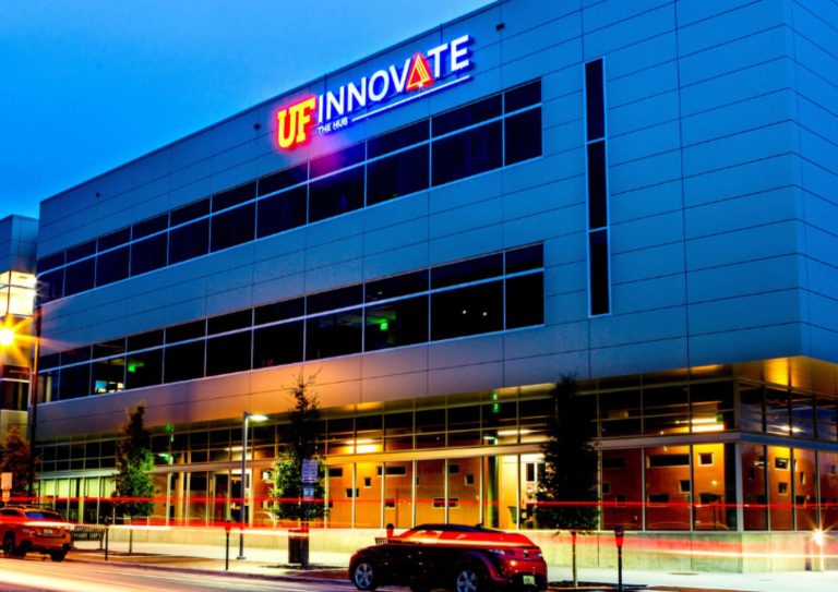 Facade of The Hub at night.