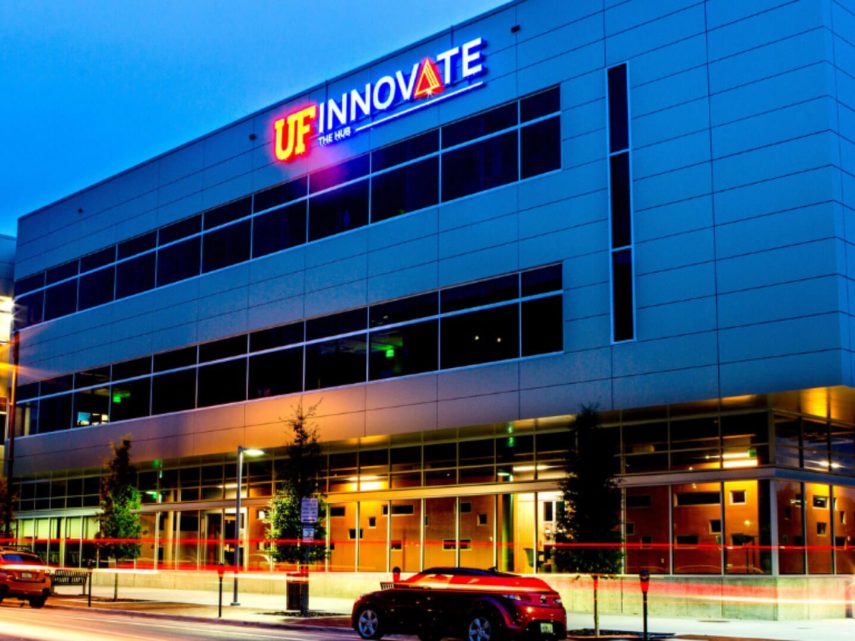 Facade of The Hub at night.